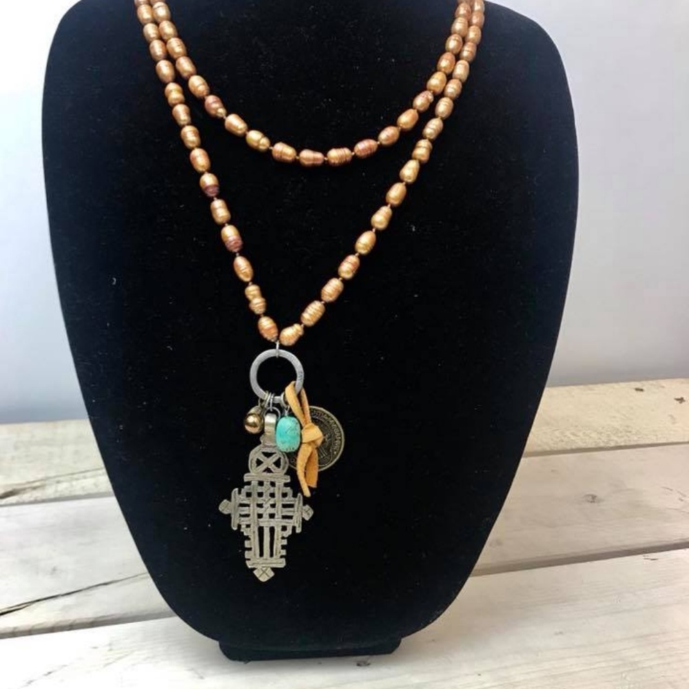 Gold Beaded Necklace with Silver Cross